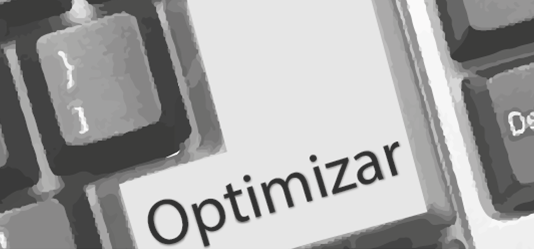 Tecla con texto "optimizar" en un teclado negro de un ordenador