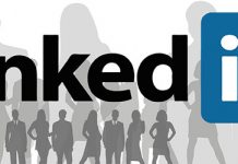 Logo de Linkedin sobre una imagen de siluetas de personal de negocios