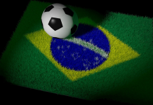 alfombra de la bandera de brasil con un balon de futbol encima