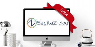 ordenador en una mesa de oficina blanco con la imagen del logo del blog de sagitaz