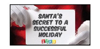 Manos de Santa Claus sujetando un cartel zoho con texto "Secret to a succesful holiday"